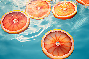 水中柑橘清凉清新摄影图