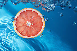 水中柑橘清凉西柚摄影图