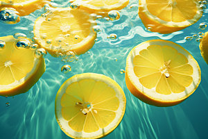 水中柑橘切片夏天摄影图