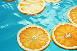 水中柑橘清爽切片摄影图