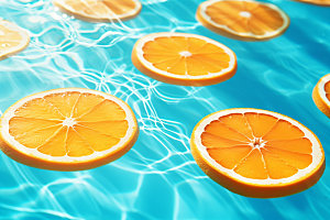 水中柑橘清爽高清摄影图