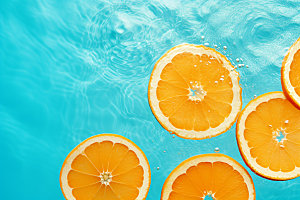 水中柑橘切片高清摄影图