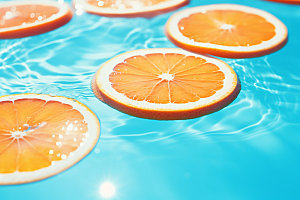 水中柑橘清凉西柚摄影图