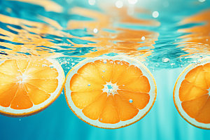 水中柑橘夏天清爽摄影图