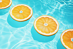 水中柑橘柠檬切片摄影图
