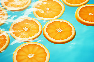 水中柑橘夏天水果摄影图