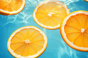 水中柑橘清凉切片摄影图