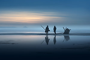 海边赶海海钓日出日落摄影图