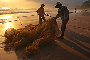 海边赶海人物剪影滩涂赶海摄影图