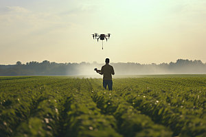 农业无人机灌溉助农摄影图