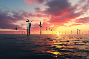 夕阳下的风力电厂风能风车摄影图