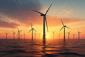 夕阳下的风力电厂风电风能摄影图