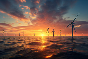 夕阳下的风力电厂风电高清摄影图
