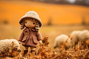 羊毛毡女孩可爱落叶摄影图