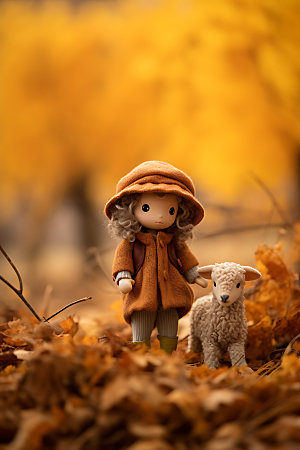 羊毛毡女孩秋天落叶摄影图