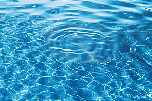 蓝色游泳池高清泳池水面摄影图