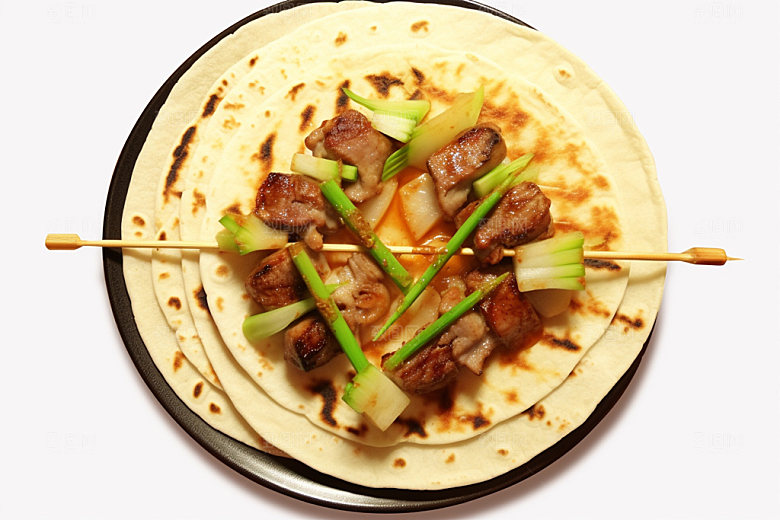 淄博烧烤卷饼美食摄影图